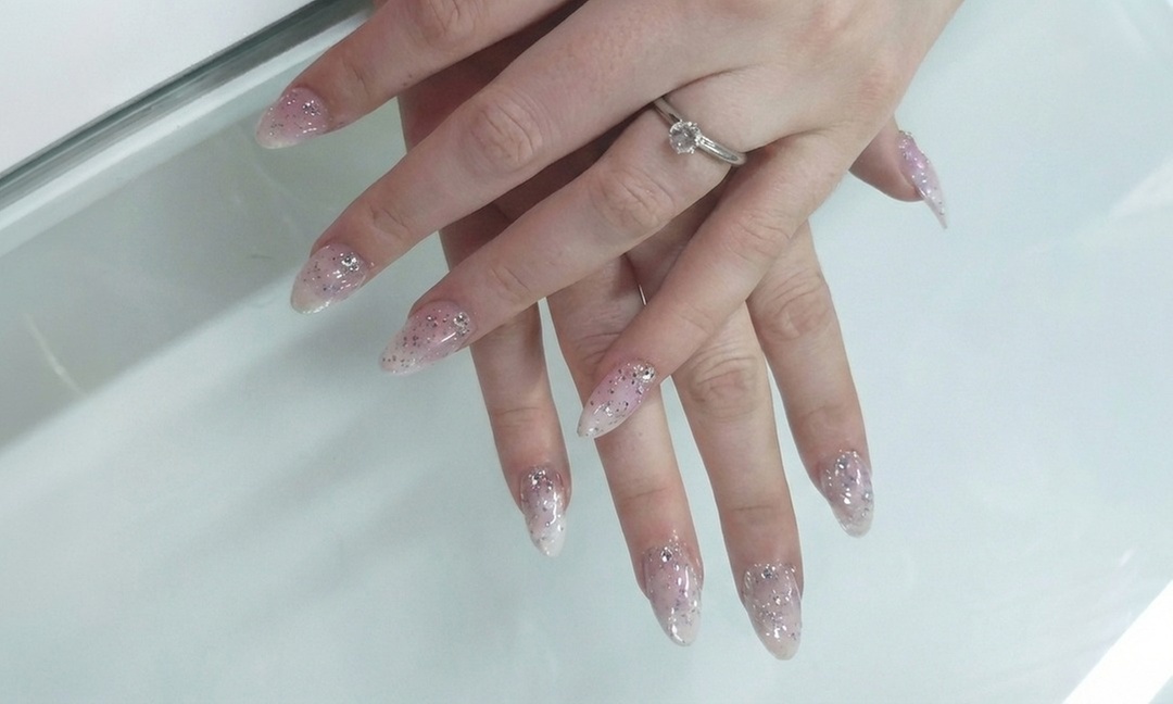 Complete Your Look with One or Two Deluxe Manicure and/or Pedicure