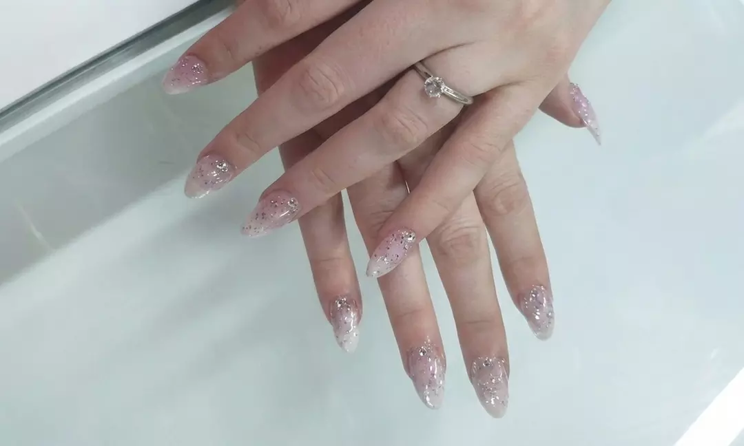 Complete Your Look with One or Two Deluxe Manicure and/or Pedicure