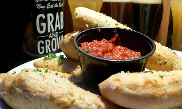 One or Two Beer Flights, Appetizers, and Growler Packages at Flo's Pizzeria Ristorante (Up to 49% Off) - Second Medium