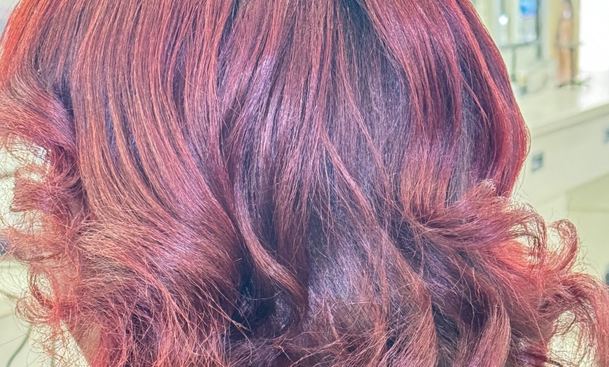 Image 10: Fresh Look Awaits: One Blowout or Silk Press at RoyalDollBeauty