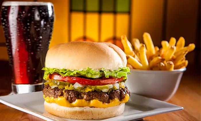 One Original Fatburger with Cheese, Skin-On Fries, and Bottomless Drink at Fatburger (C$14.46 Value) - Primary Image
