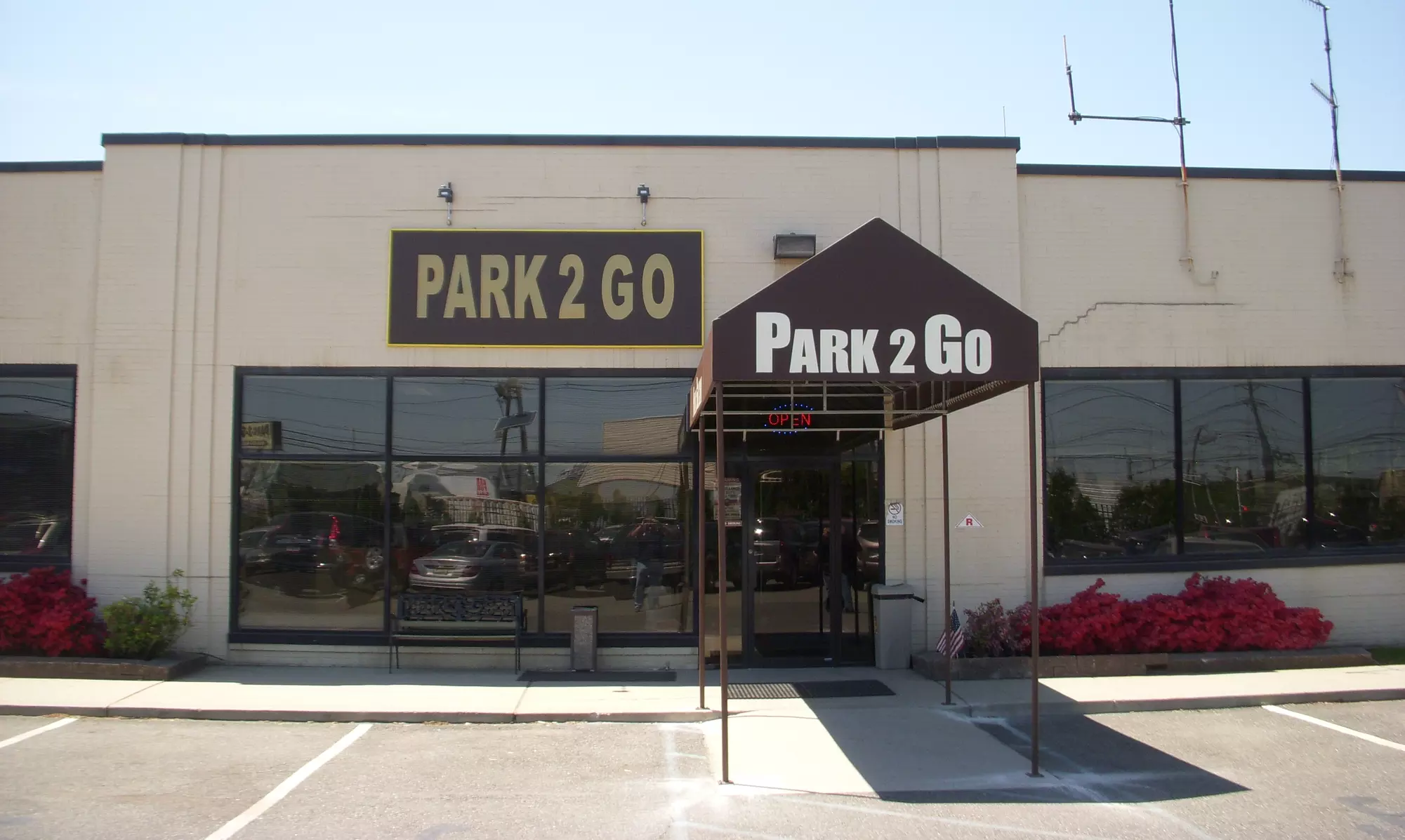 Outdoor or Indoor Valet Parking at EWR Incl. Fees & Tax at Park2Go.com. Eight Options Available. - Primary Image