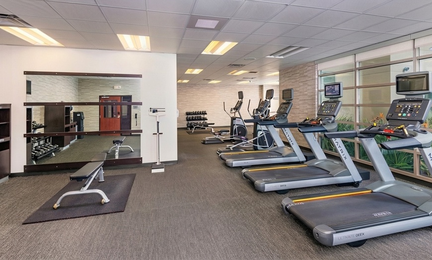 Image 5: Courtyard-Style Hotel Retreat with Outdoor Pool & Bistro Dining