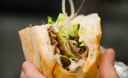 $12 for a Pub Meal with Appetizer and Entrees for Two at The Dig Pub in Cedar Park (Up to $25.50 Value) - Primary Image