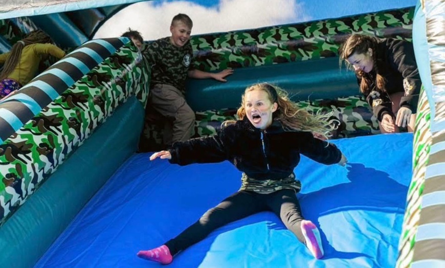 Image 9: Bounce Camp: Family Tickets for 640ft Inflatable Obstacle Course Fun