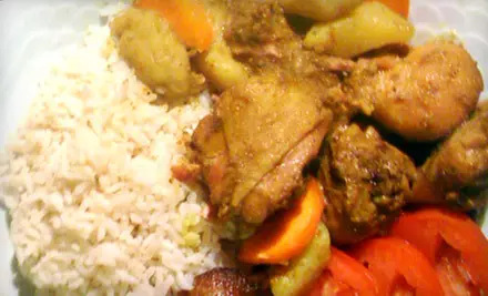 $10 for an Authentic Jamaican Meal with Soup, Side, and Soda for Two at Jerk Machine (Up to $20.44 Value) - Primary Image