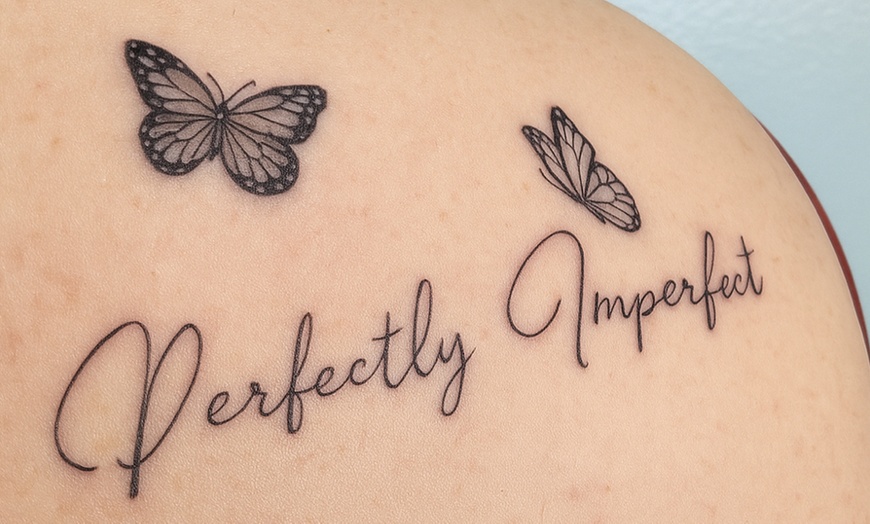 Image 2: Transform with a Small or Medium Fine Line Tattoo Design