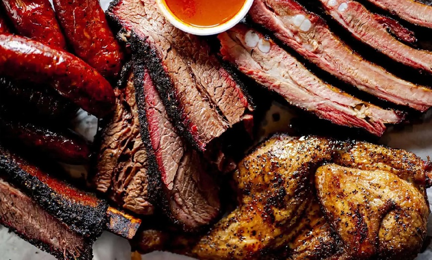 Image 1: Savor a BBQ Feast: Quarter Chicken, Family Meal or $50 Food & Drink 