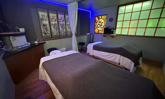 Relax with 60 or 90-Minute Hot Stone Massage with Wood Therapy