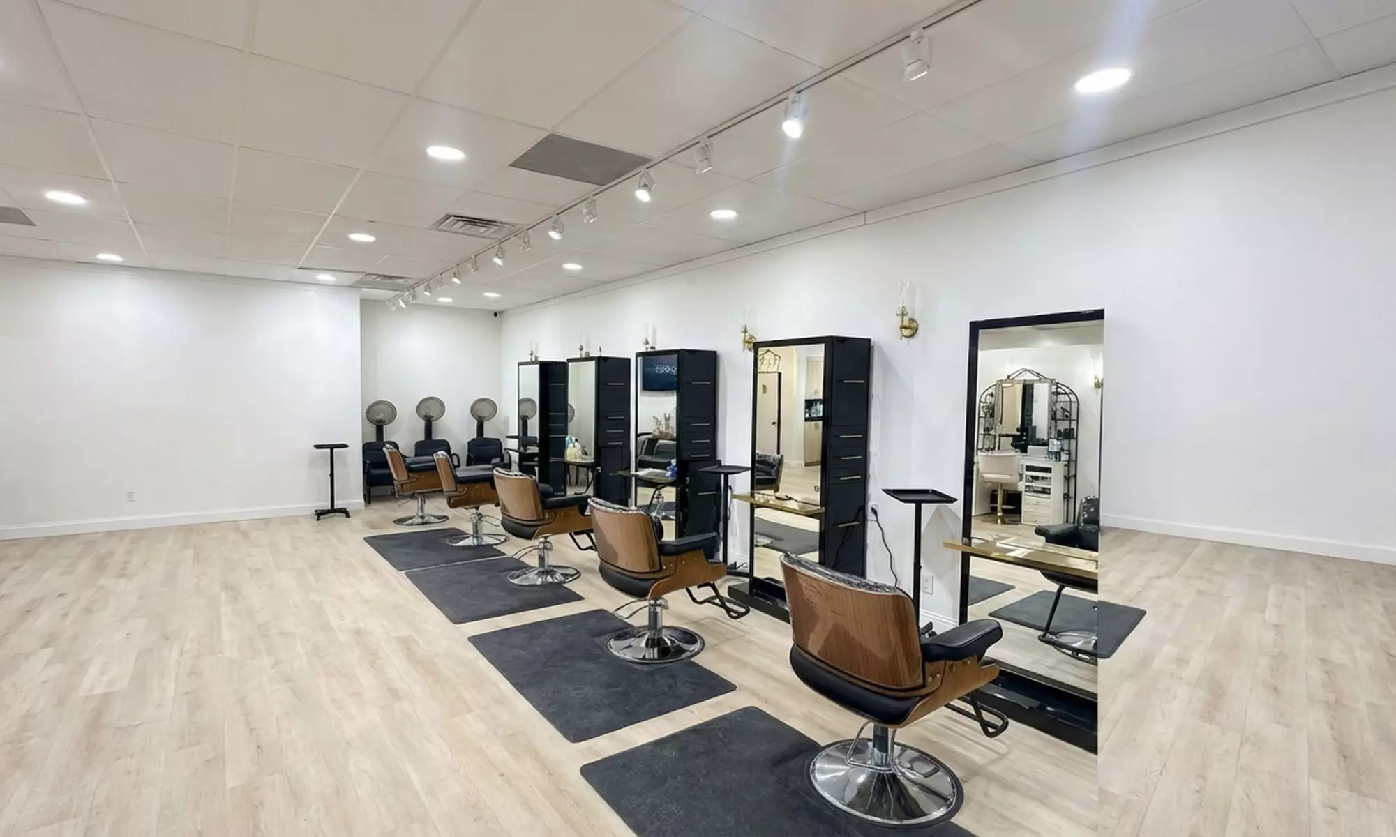 Elevate with One Brazilian Blowout, Keratin Treatment, Women's Haircut, Shampoo, Blow Dry & More (Up to 39%Off)