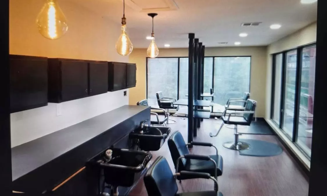 One Women's Haircut, Shampoo, Conditioning, Blow-Dry, Style and More