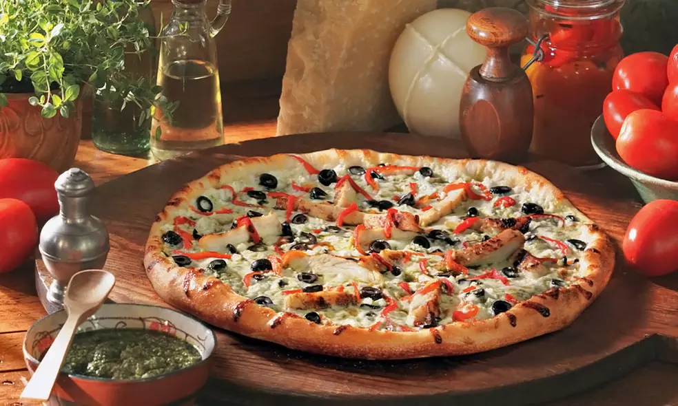 Large Pizza, Breadsticks, and Garden Salad for Carryout or Delivery at Vocelli Pizza (Up to 43% Off) - Primary Image