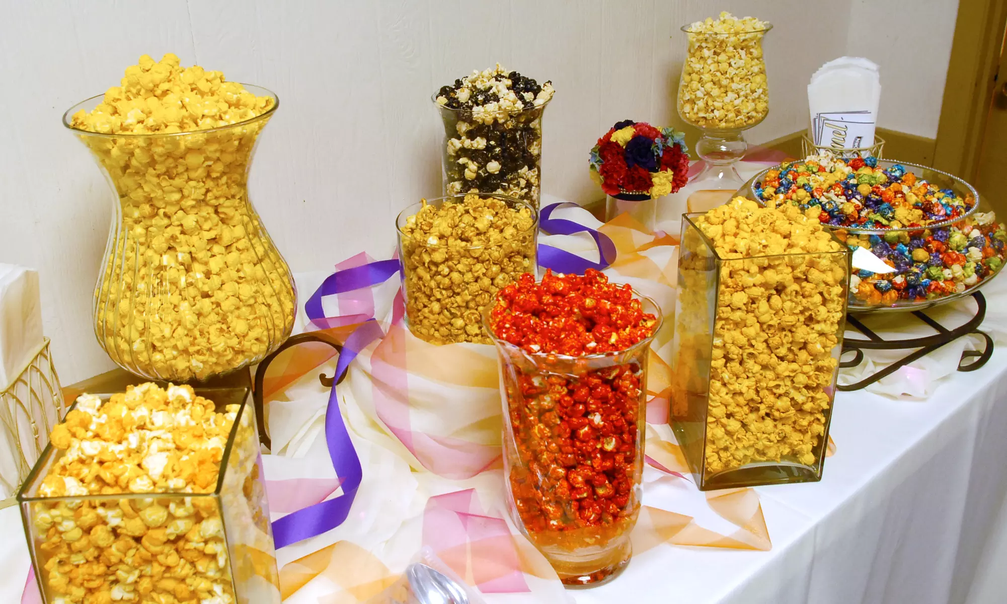 $15 for Three Groupons, Each Good for $10 Worth of Gourmet Popcorn at Reel Popcorn ($30 Value) - Primary Image