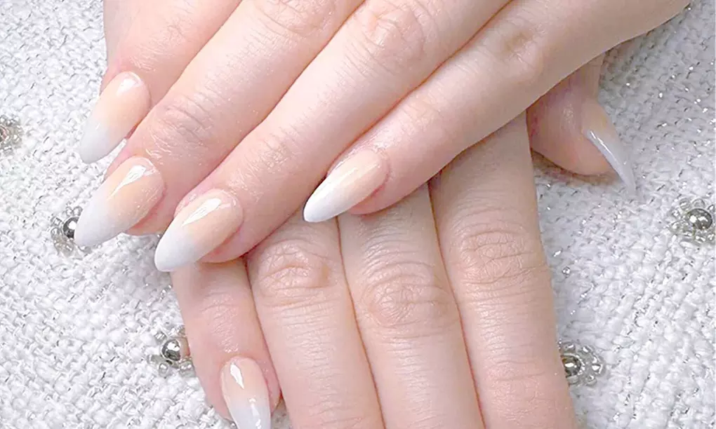 Indulge in a Gel Manicure or Gel Pedicure with a Glass of Champagne