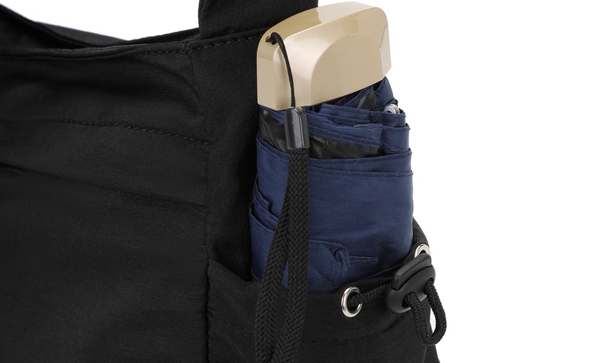 Image 3: Bandolera de estilo casual con correa ajustable y múltiples bolsillos
