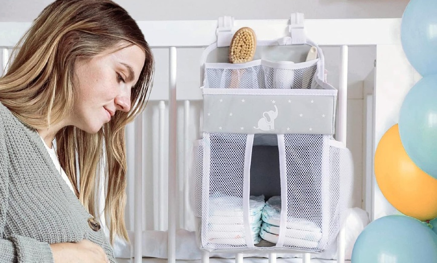 Image 4: Cradle Star Hanging Nursery Organizer - Multi-Compartment Baby Changing Table Storage Caddy with Door Hook