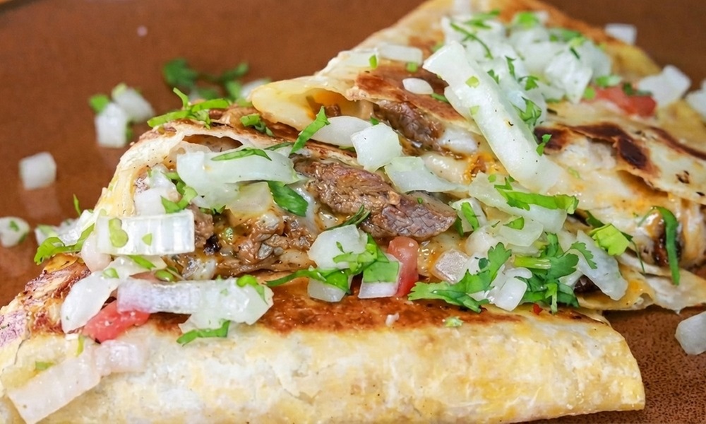 Enjoy authentic Mexican cuisine at Que Onda Tacobar