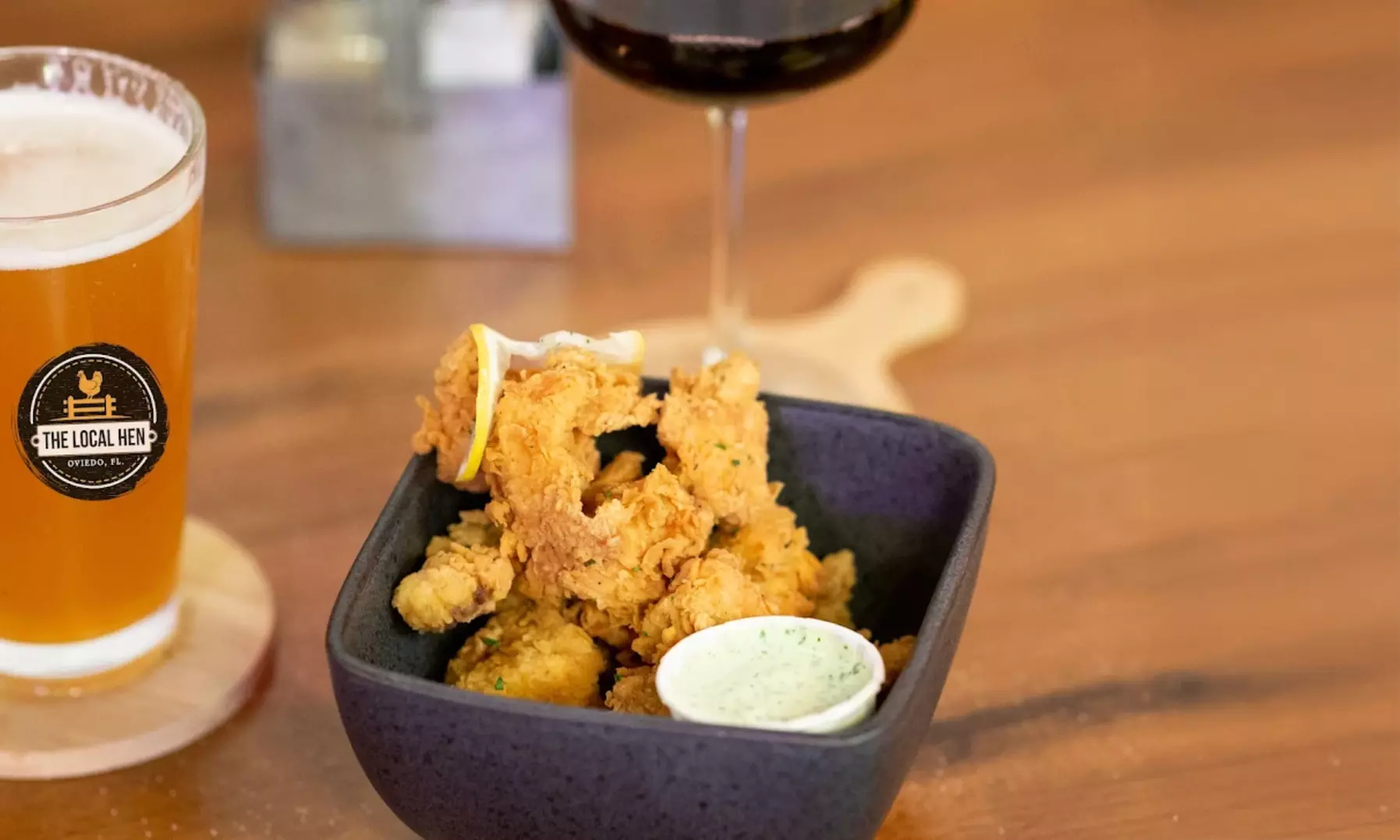 Savor 10 or 20 Wings, 1 or 2 Entree, and Drinks!