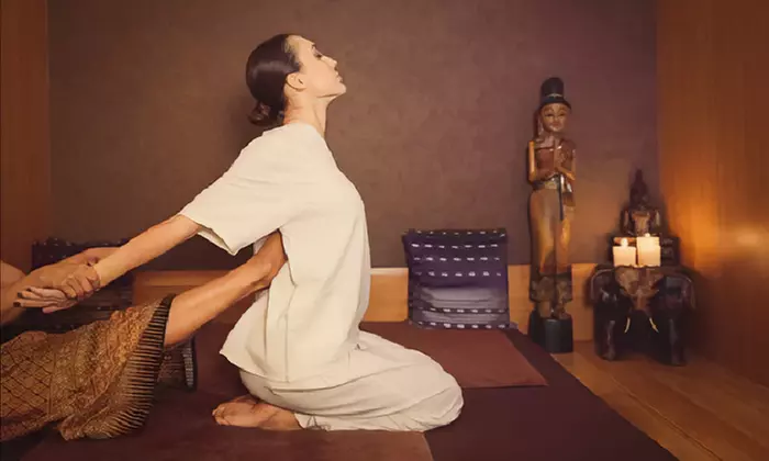 60- or 90-Min Thai Massage with Oil, Hot Stones, Scrub, or More