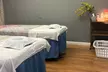60 or 90-Minute Signature Massage with Hot Stone, Hot Pillow, Deep Tissue and Essential Oil ( Up to 44% Off ) - Second Medium