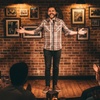 Image 1:  Satisfy Your Cravings: Stand Up Comedy, Drink + Tasting Dish Up to 4 