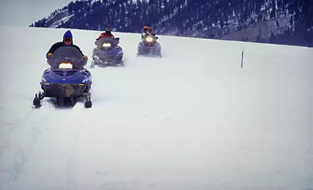 Snowmobile Rentals with Transportation to and from Elk Lake Resort (Up to Half Off). Three Options Available. - Primary Image