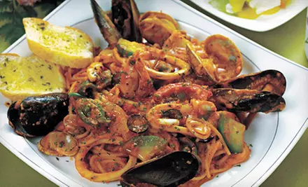 Southern Italian Cuisine at Caesar’s Den (Up to 56% Off). Two Options Available. - Primary Image