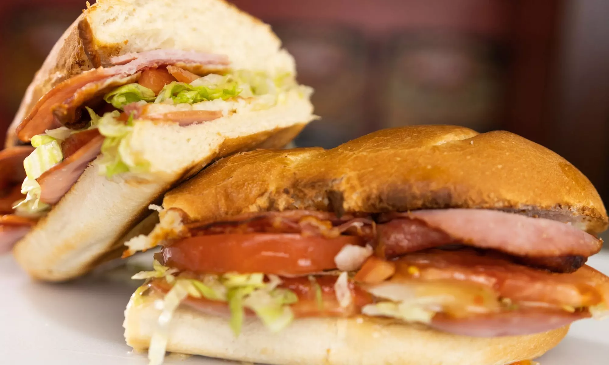 2 Large Oven Baked Subs w/ Two 20 Oz Drinks, 2 Topping Pizzas & More