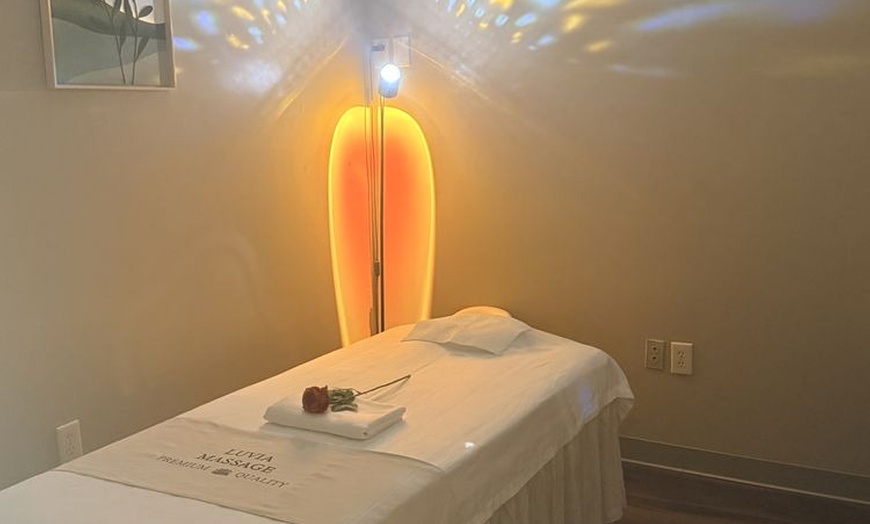 Image 6: Massages for 1 or 2 with Hot Towels, Organic Massage Oil and Lemon Tea