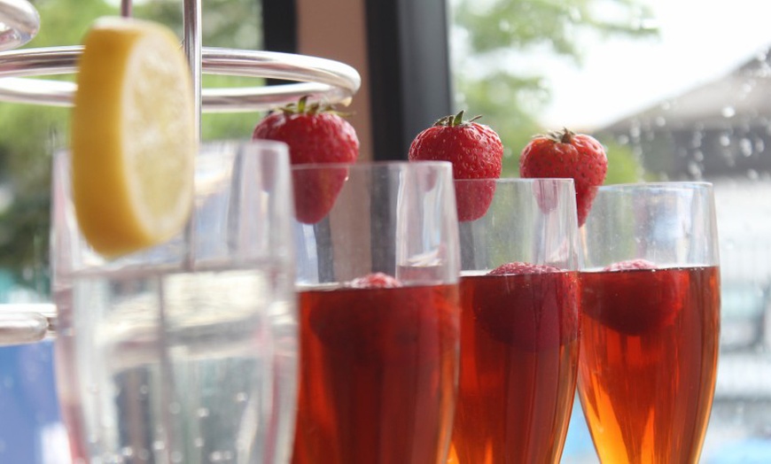 Image 7: Wimbledon Themed Afternoon Tea Bus Tour with Prosecco & Souvenir Mug!