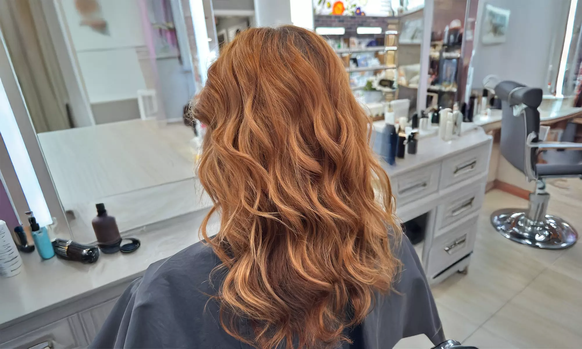 Haircut & Blow-Dry with Color, Highlights, Toner or Extensions