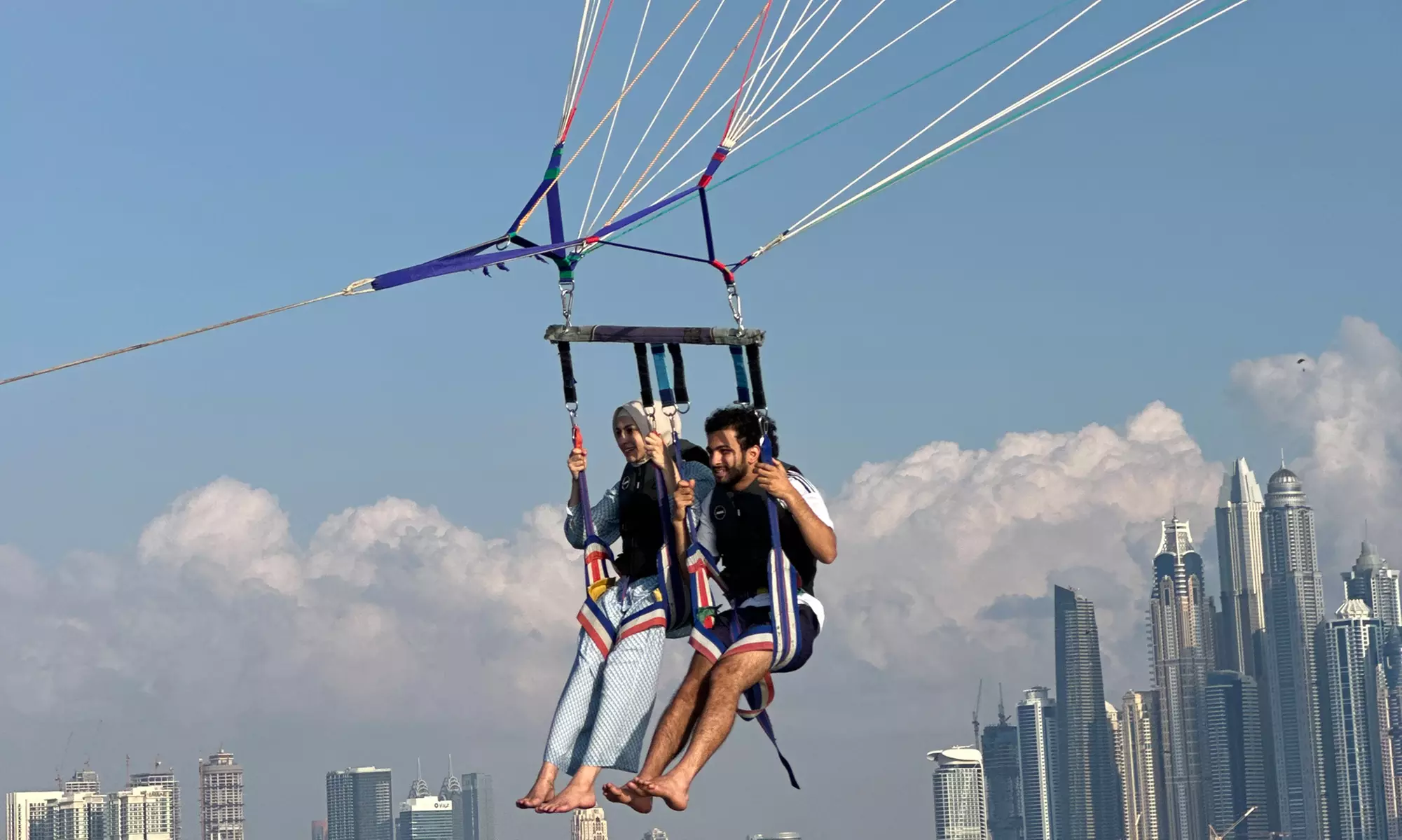 Soar Above Dubai's Coastline with 30-Minute Parasailing for One or Two