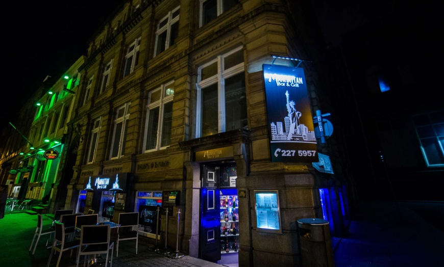 Image 1: 2 Course Meal with Drinks for 2-4 at Manhattan Bar & Grill