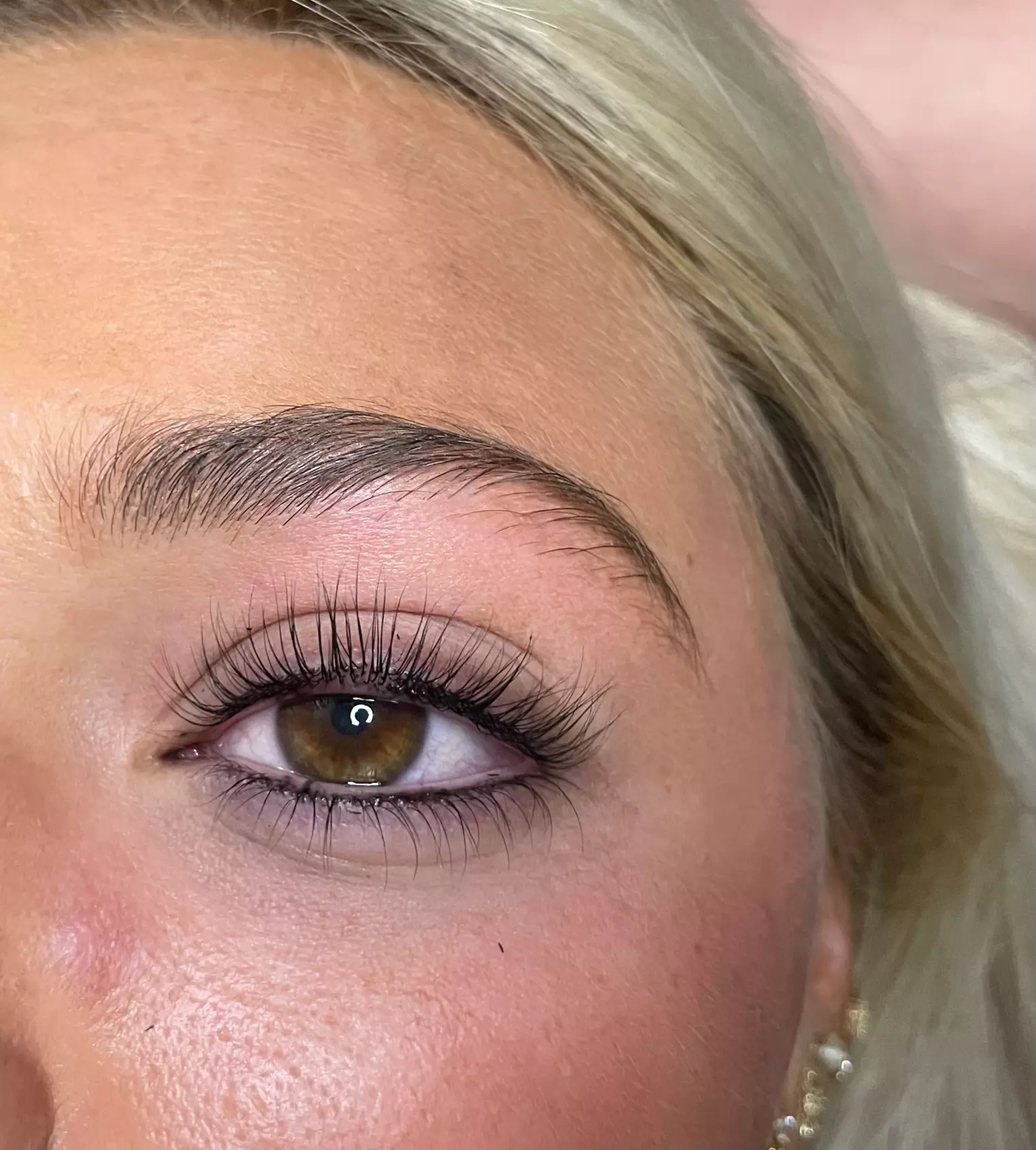 Glow & Lift: Spa Facial with Brow Thread or Lash Enhancements