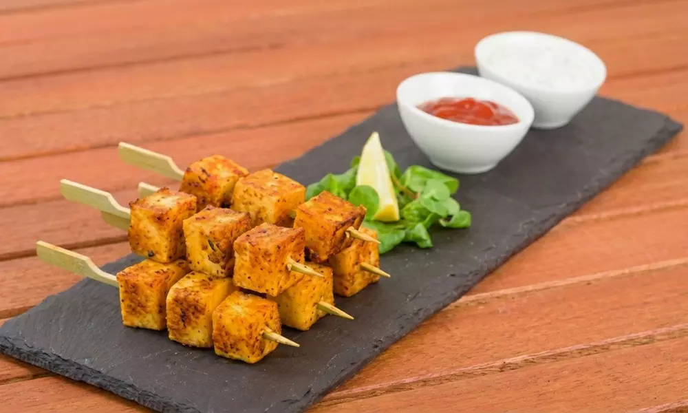 Three Course Indian Meal with Bottle of Wine for Two or Four People