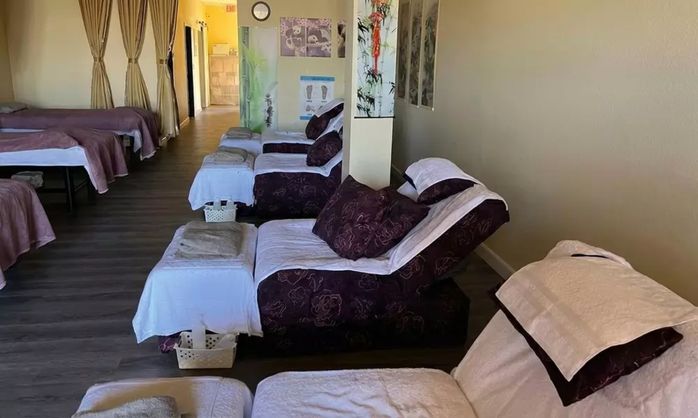 Relax with 60, 90, or 120 Min Massage with Hot Stone and Coconut Oil