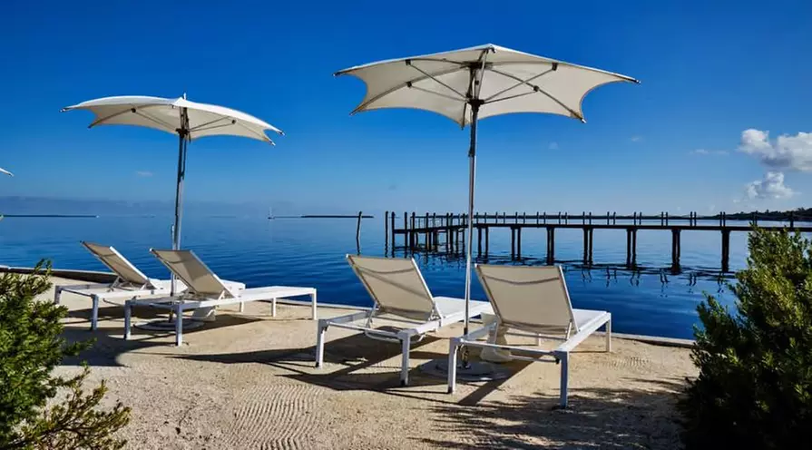 Relax by the water with stunning views and tropical vibes