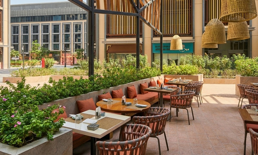 Image 3: Daily Dinner Buffet with Live Cooking Stations & Beverages