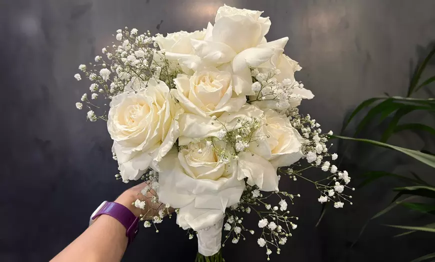 Image 1: Stunning Bridal Bouquet with 9 White Roses and Baby's Breath