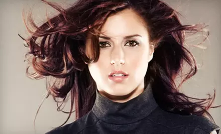 Women's Haircut, Style, and Eyebrow Wax, or Men's Haircut and Style at Keith's Haircenter in Neenah (Up to 54% Off) - Primary Image