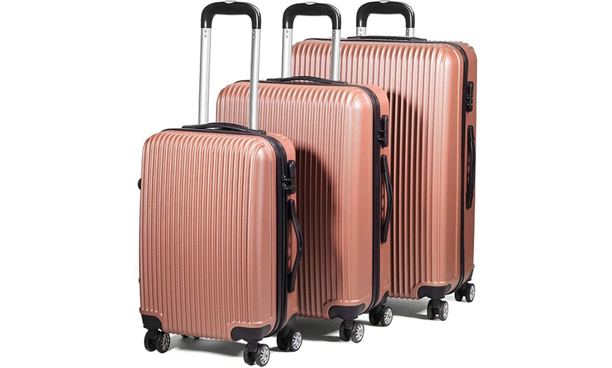 Image 6: Three Lightweight Hard Shell Suitcases