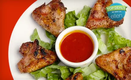 $15 for $30 Worth of Jamaican Fare and Drinks at De Palm Tree Restaurant in University City - Primary Image