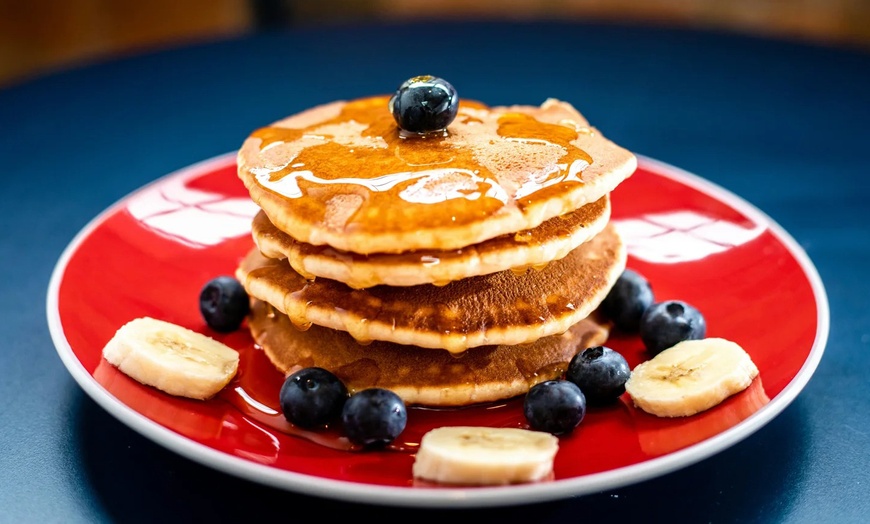 Image 2: Waffles or Pancakes with a Drink for One, Two, Three, or Four People