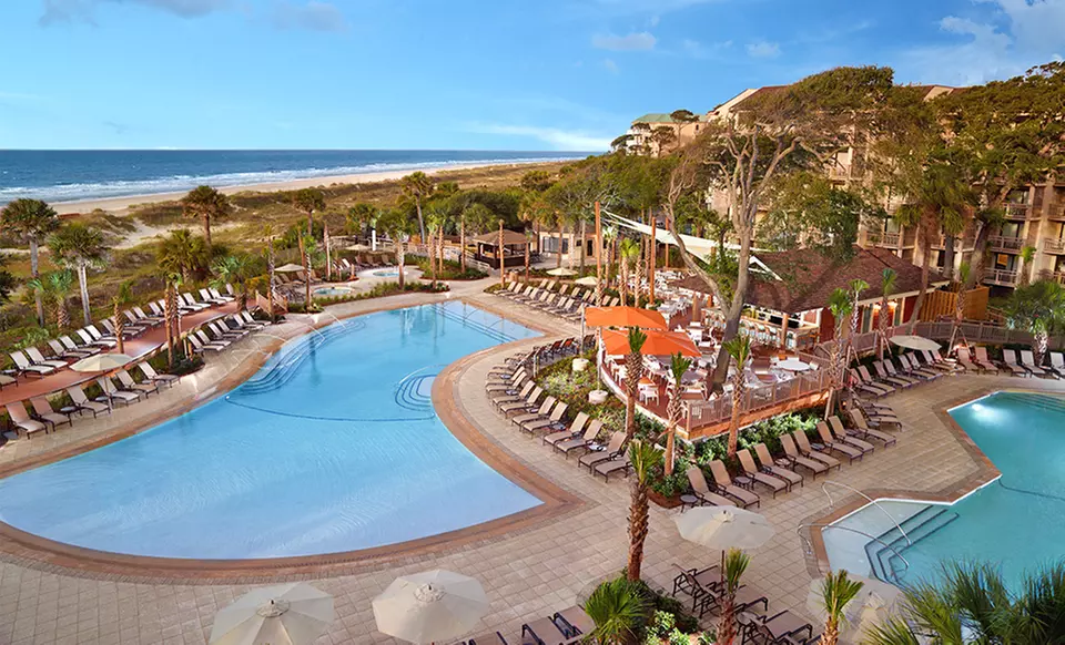 ✈ 4-Night Omni Hilton Head Vacation with Airfare. Price/Person Based on Double Occupancy. Two Groupons Required. - Primary Image