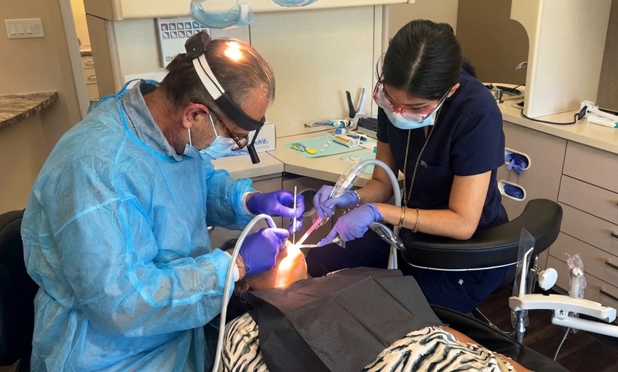 Image 4: One or Two Sessions of Dental Care Package: Exam, Cleaning, and X-Rays