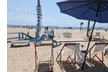 Beachside Fun: Sunbed Lounges, Paddle Board Adventures/More @Monty’s Dog Beach & Bar - Long Beach(Up to 30% Off) - Second Medium