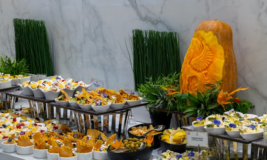 Image 2: Experience a Delicious Dinner Buffet with Drinks at an Iconic Venue