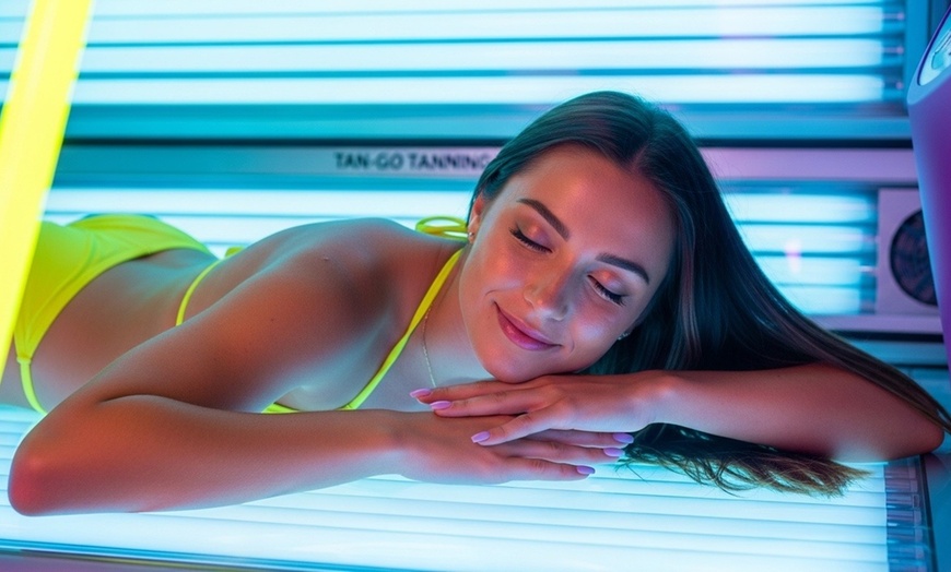 Image 1: Unlimited UV Tanning for One Week/Month or Single VersaSpa Spray-Tan