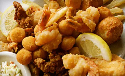 Seafood or Steak Meal with Appetizers for Two or Four at Lighthouse Restaurant (Up to 61% Off) - Primary Image
