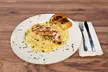 Satisfy Your Cravings: $40 or $80 To Use Towards Food & Drinks at Great American Casino Tukwila (Up To 40% Off) - Second Medium